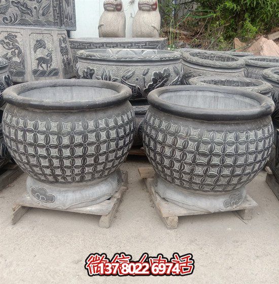 自然美學(xué)結(jié)合青石石雕、浮雕、編織、雕塑的戶外園林魚缸