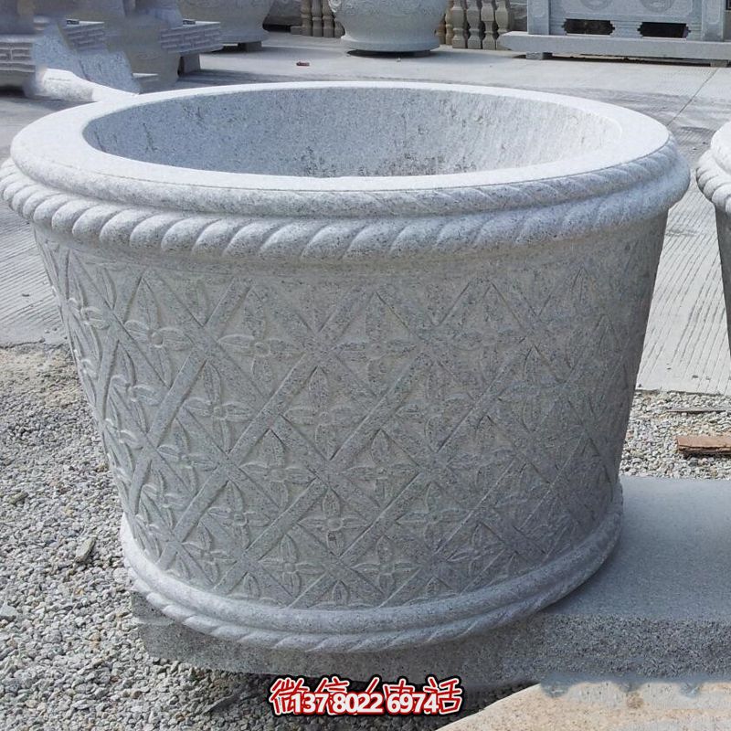 現代石雕庭院小區(qū)創(chuàng)意花盆雕塑